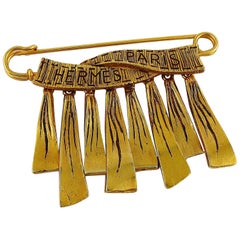 Hermes Vintage Gold Toned Safety Pin Ribbon Charms Brooch