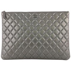 Chanel O Case Clutch Quilted Lambskin Large