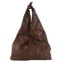 The Row Bindle Knot Hobo Leather, crafted in brown leather