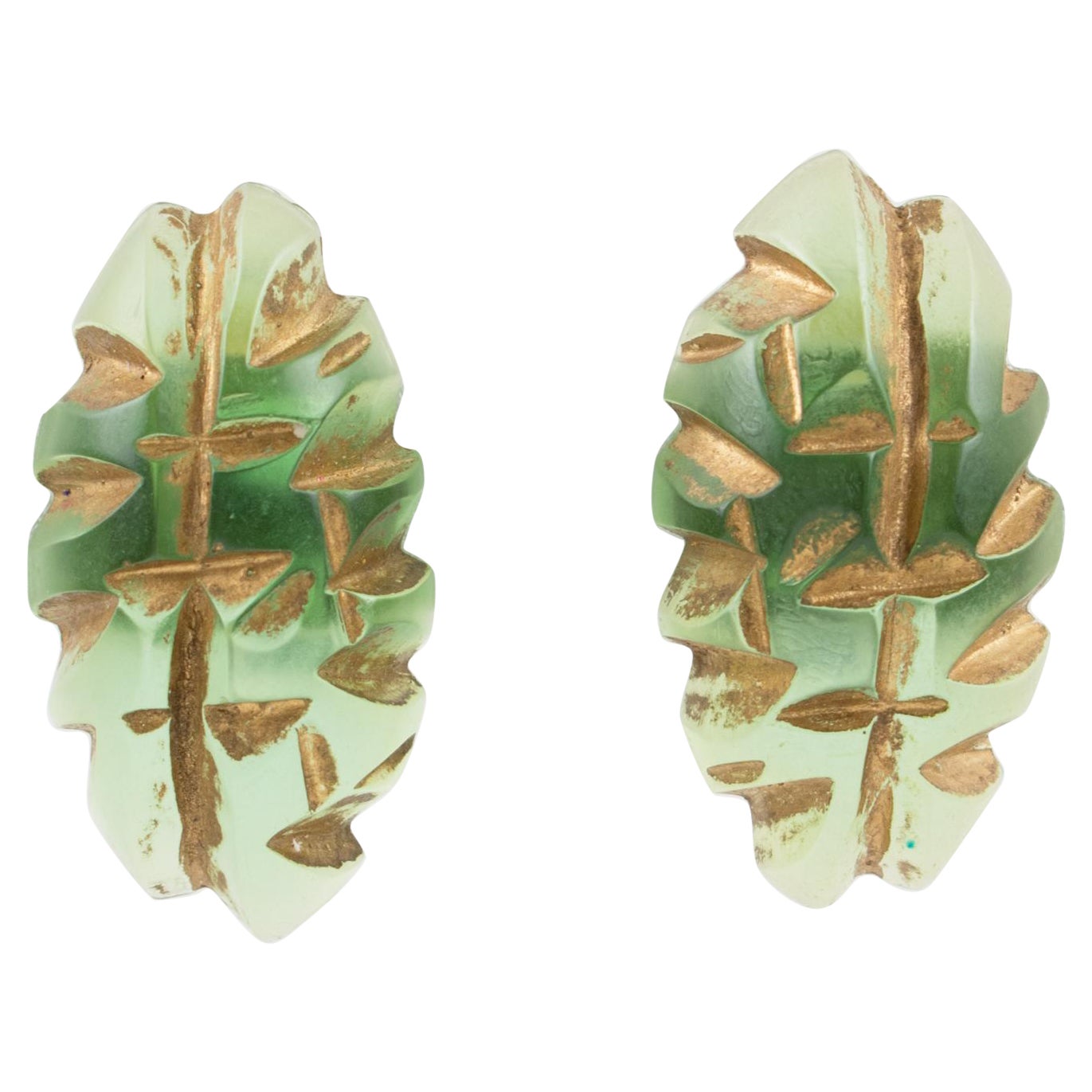 Translucent Green Lucite Clip Earrings with Gilt Application Carving For Sale