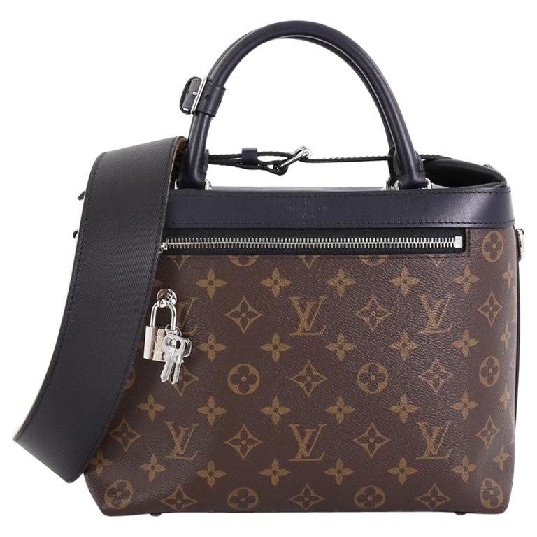 This Louis Vuitton City Cruiser Handbag Monogram Canvas and Leather PM