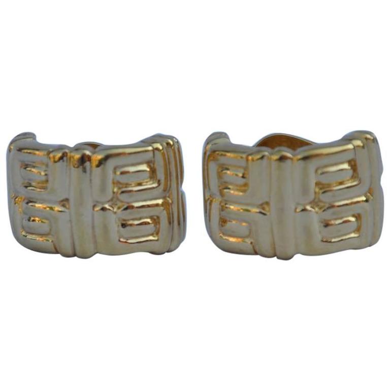 Boucles d'oreilles Givenchy Signature Logo en or doré avec logo