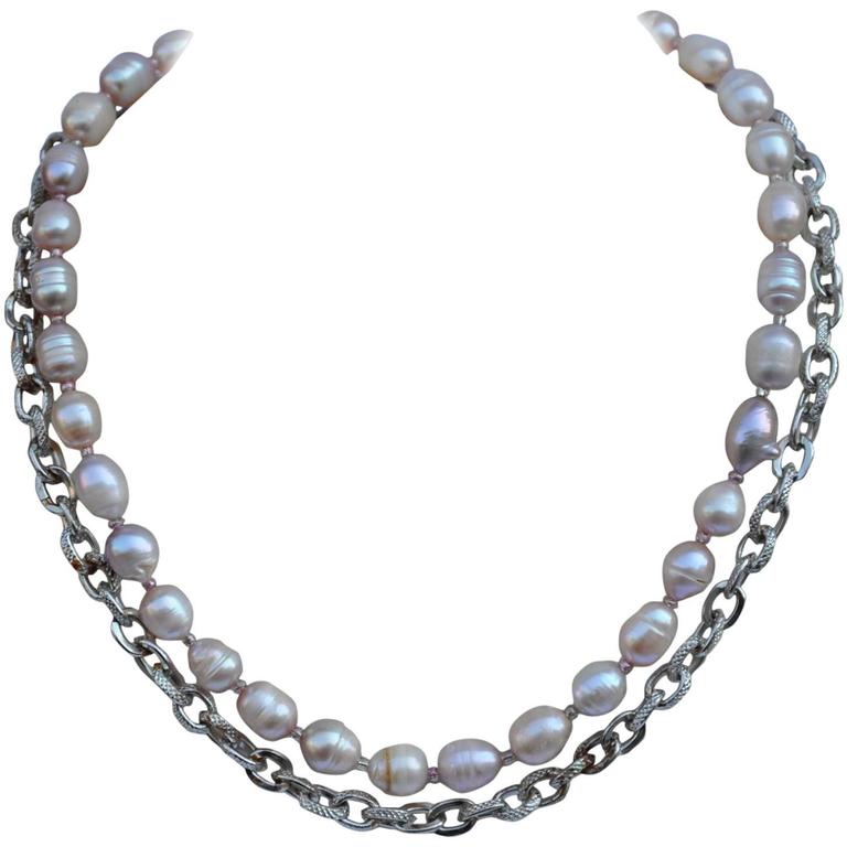 Collana a doppio filo in A. Silver dorata e perle naturali