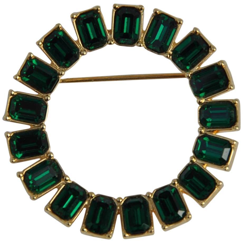 Monet Circular Gilded Gold with "Emerald" Rhinestone Brooch For Sale