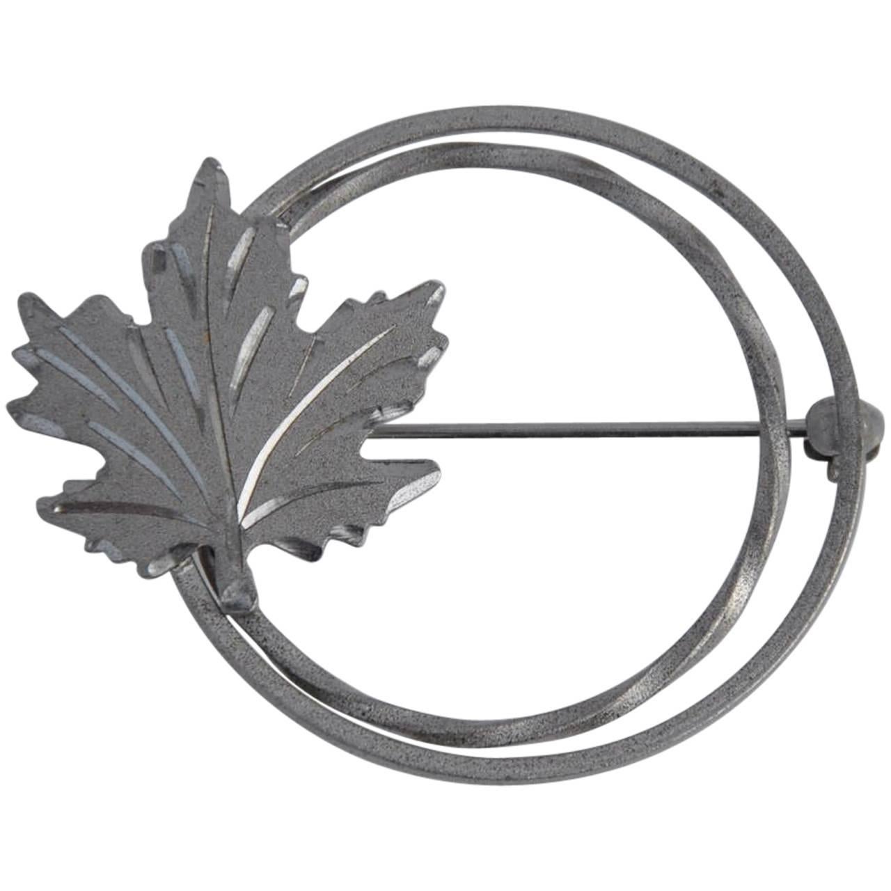 Circular Silver "Leaf" Brooch For Sale