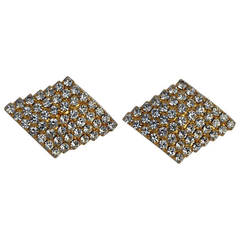 Clip per orecchie in oro dorato e strass