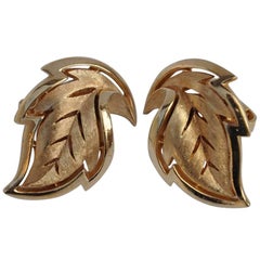 trifari clip on earrings Trifari Etched Gilded Gold Tone "Leaf" Ear Clips