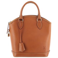 Louis Vuitton Lockit Handbag Nomade Leather PM 