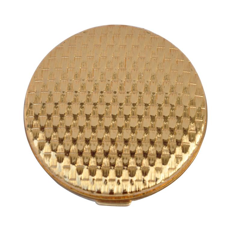 Elizabeth Arden - Poudrier en or doré « tissage à base de croix »