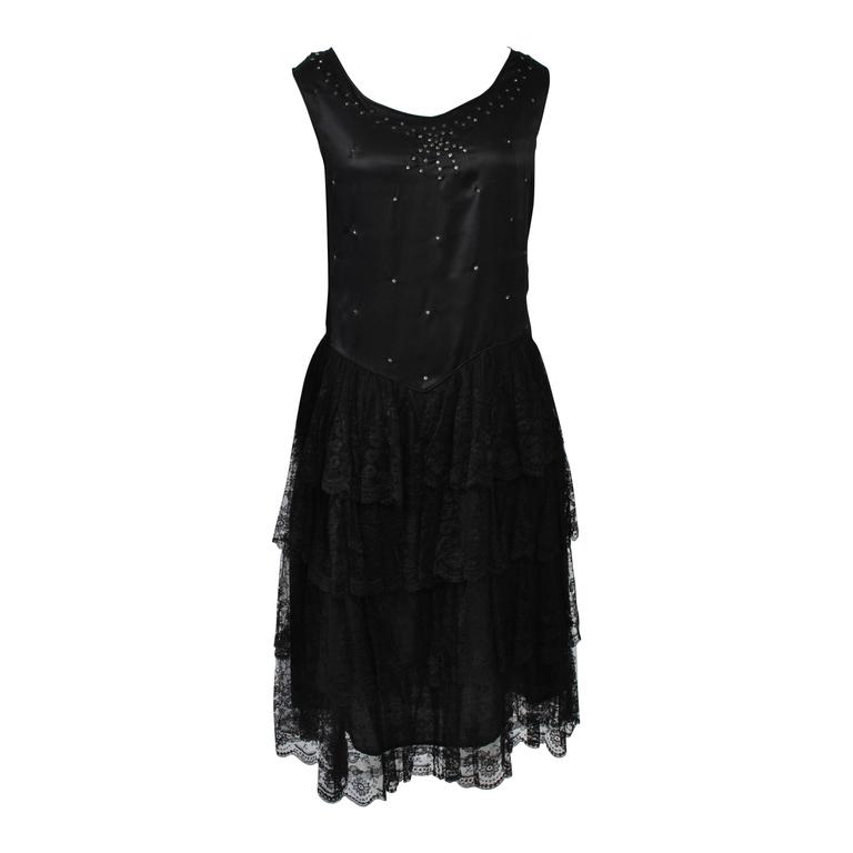 Schwarzes Kleid aus Seide und Spitze aus den 1930er Jahren