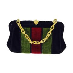Velvet chain handle bag in red, black & green 1970s