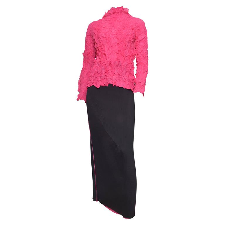 pink top with black skirt