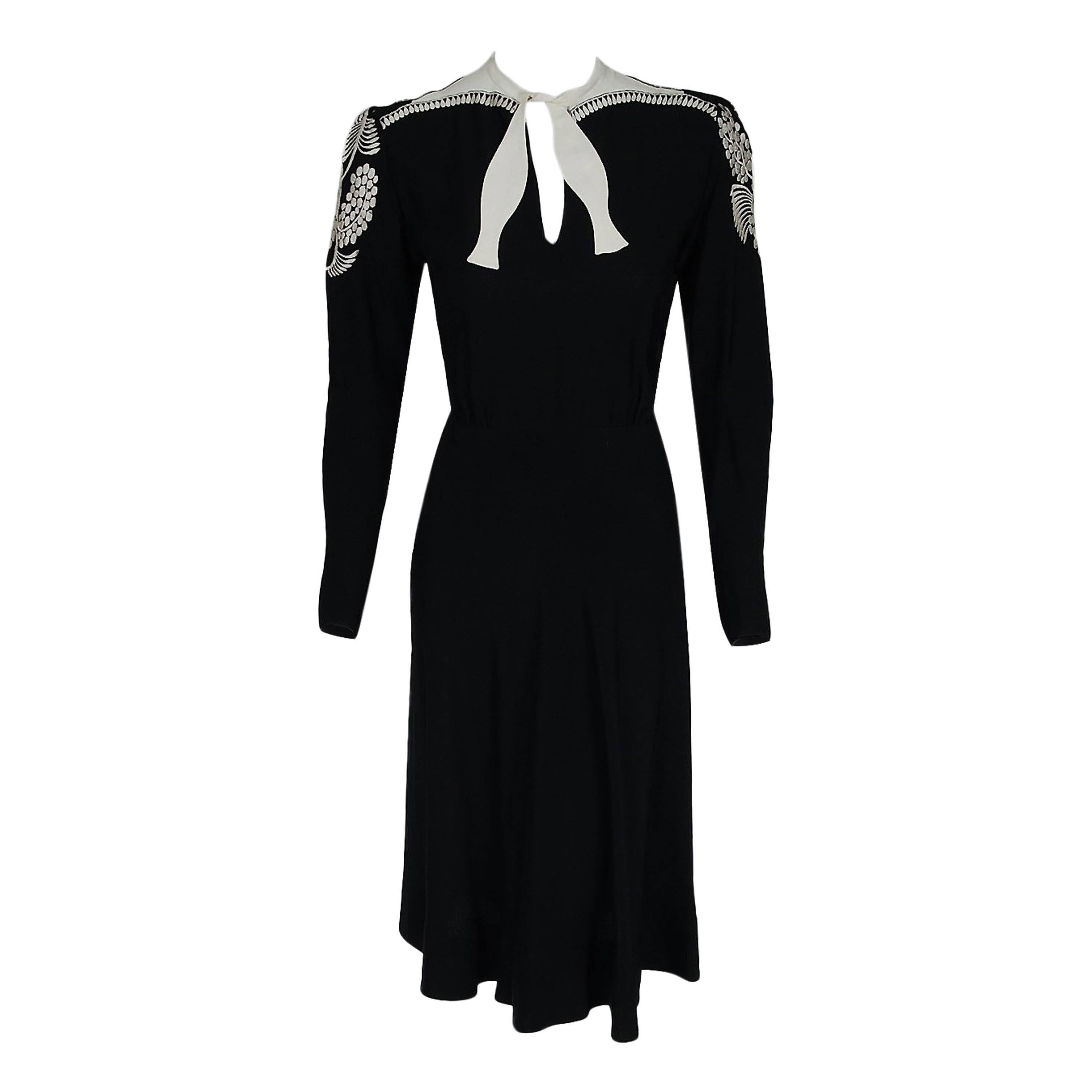 1940
s Nina Ricci Haute-Couture Black 
White Embroidered Silk Tie-Neck Dress