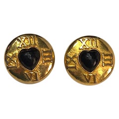 Boucles d'oreilles Escada Buttoms des années 1980