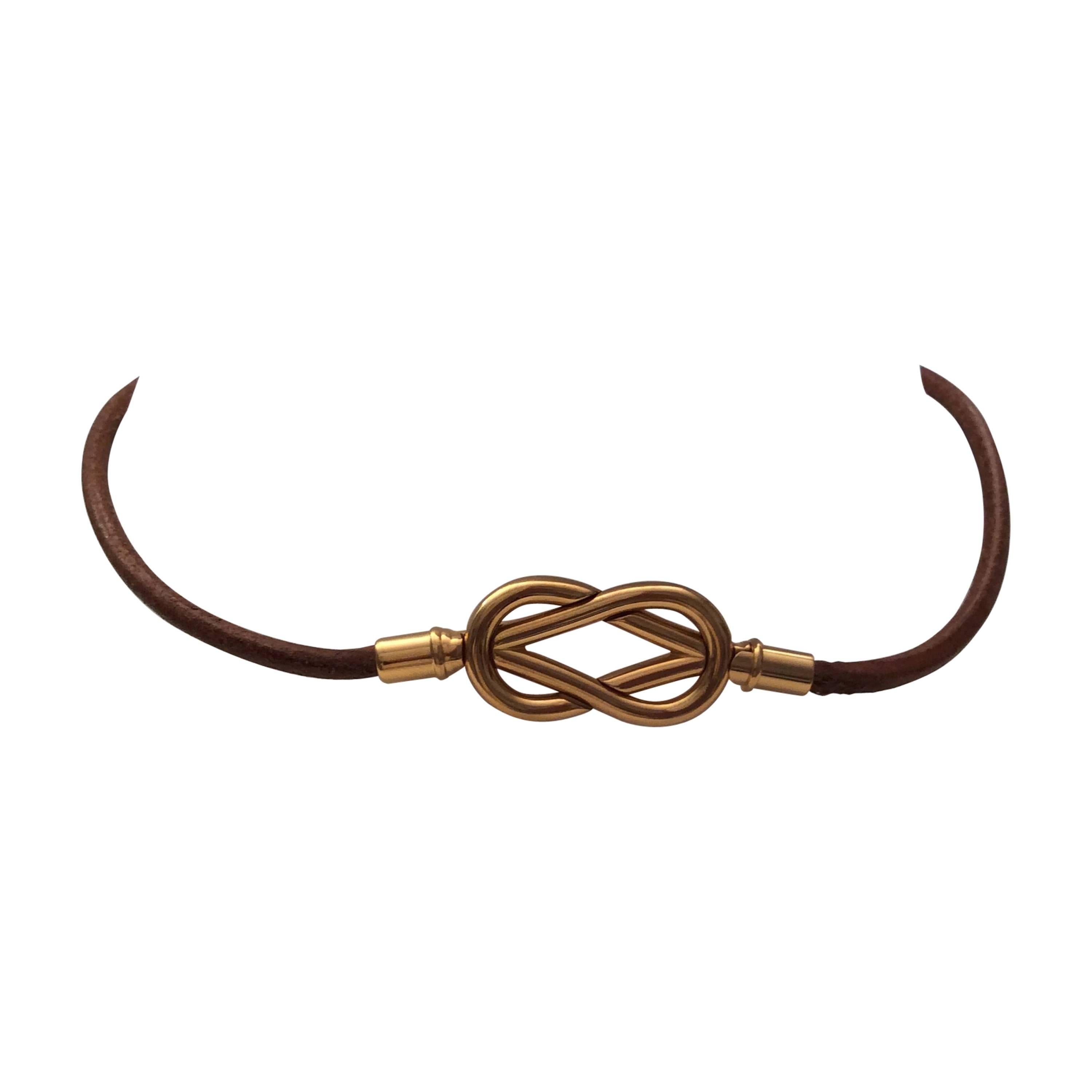 Hermes Gold Tone Love Knot Necklace
