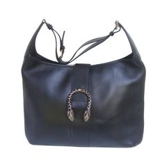 Gucci Italy Rare Ebony Leather Tiger Clasp Handbag