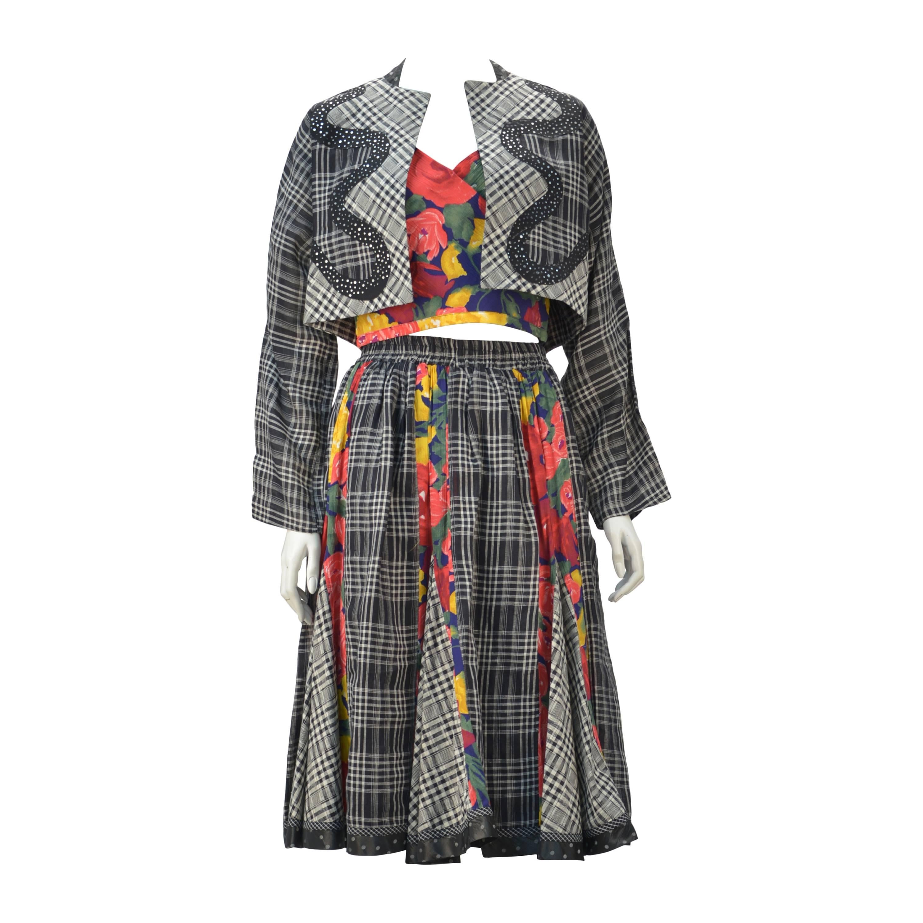 Fun and vibrant 1980's three piece halter top, skirt and crop jacket ensemble by recently deceased and unique designer Koos van den Akker.  Worked for Christian Dior before traveling home to his native home in the Hague, Netherlands.  With an