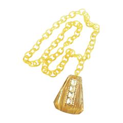 Art Deco Applejuice bakelite and baguette rhinestone pendant