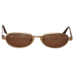 Georgio Armani - Lunettes de soleil en or poli avec monture en écaille de tortue