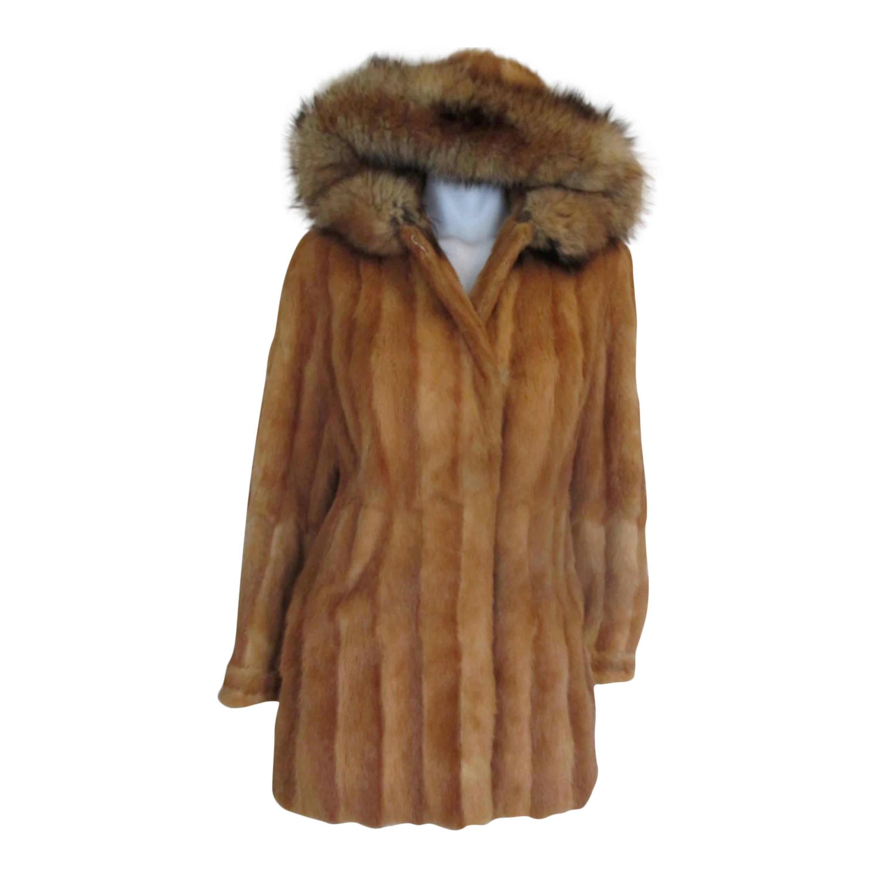 exclusive hooded fur coat with fox ruff 