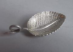 Antique A rare Cast Caddy Spoon made in London in 1862 by George Adams.