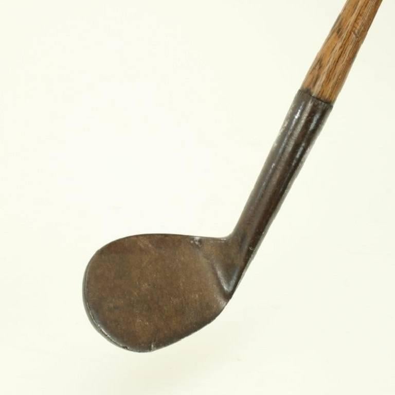 Antique hickory golf club, Niblick, Auchterlonie, St. Andrews. 
A good smooth faced ladies niblick in original condition with hickory shaft and suede leather grip. The head stamped ‘D. & W. Auchterlonie, St Andrews’ with the ‘Rose’ cleek mark of