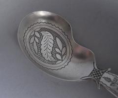 A very rare George III "Kidney" Caddy Spoon made by Cocks & Bettridge.