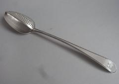 A very fine George III Straining Spoon made in London in 1776 by Walter Tweedie