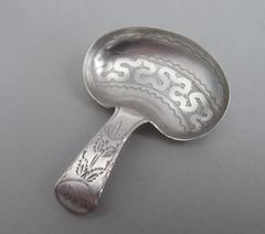 A very rare George III "Kidney" Caddy Spoon by Cocks & Bettridge.