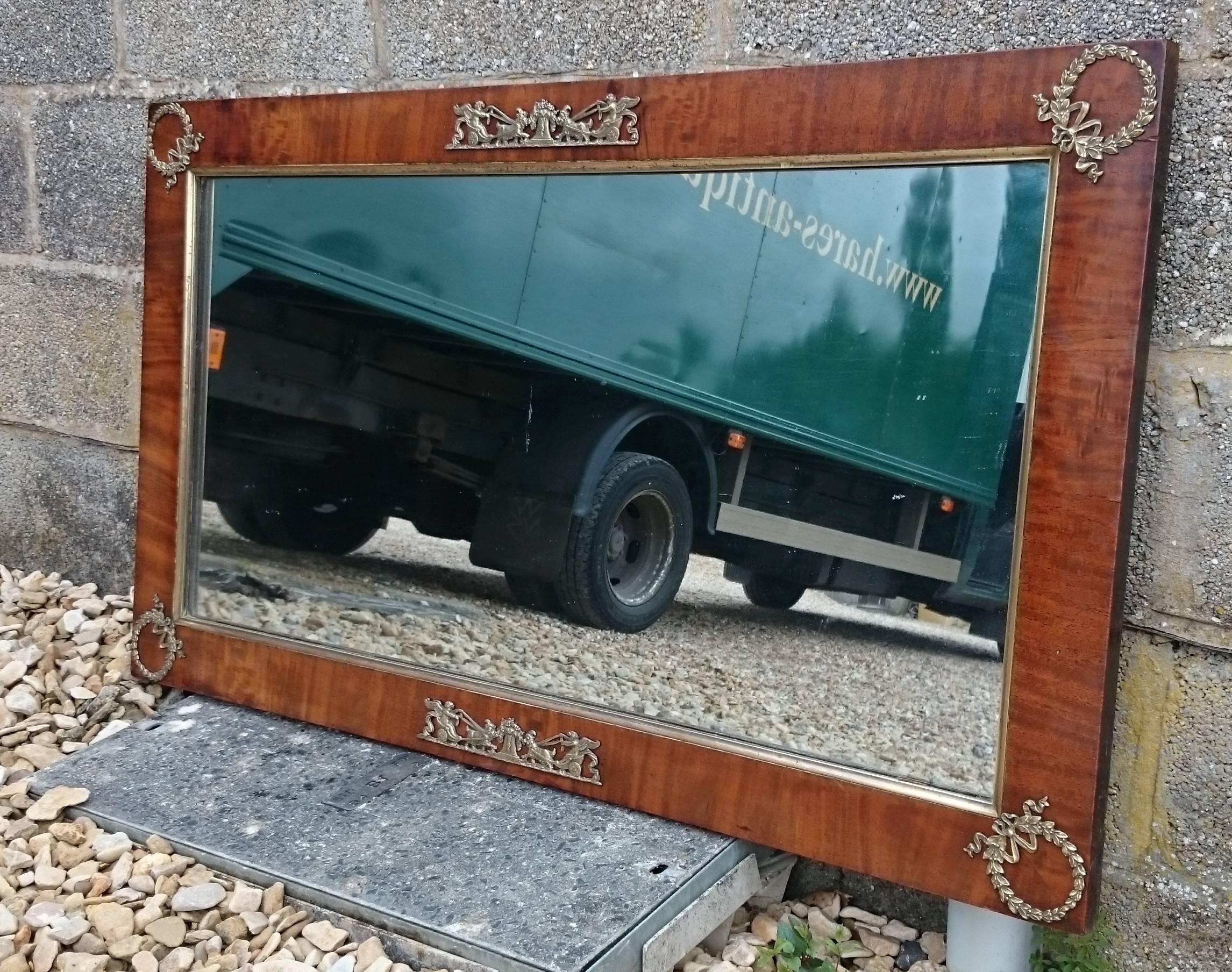 Mahogany and ormulu mounted antique mirror, this mirror is a particularly fine colour and is made of a really good cut of timber. 

French, circa 1830 

49½