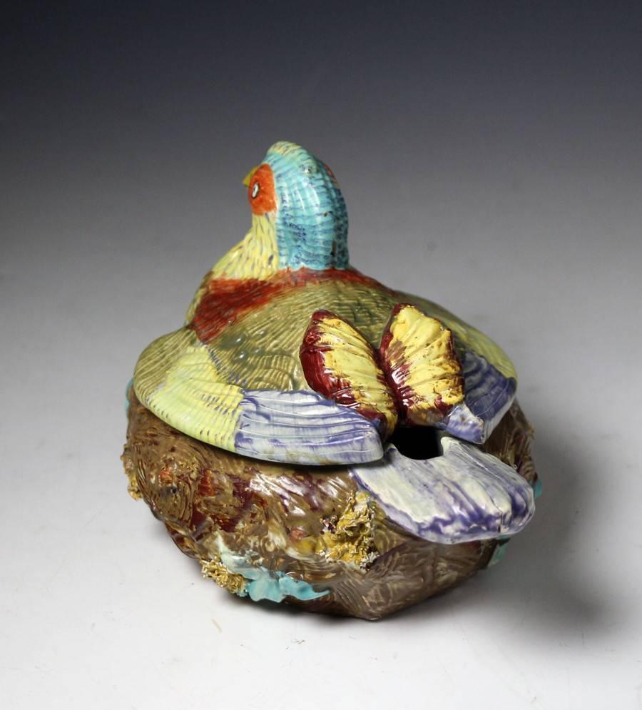 A well modelled and strikingly colored pheasant tureen. 
Staffordshire pearlware pottery early 19th century period. 
A fine example of this rare piece.