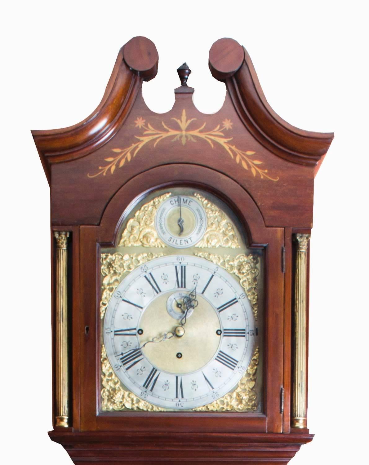 This is a beautiful antique late Victorian, marquetry, mahogany, 8 day, musical chiming longcase clock circa 1880 in date. 

It has an eight-day five pillar movement on an arch dial and chimes on 8 bells and a gong on each quarter hour. The clock