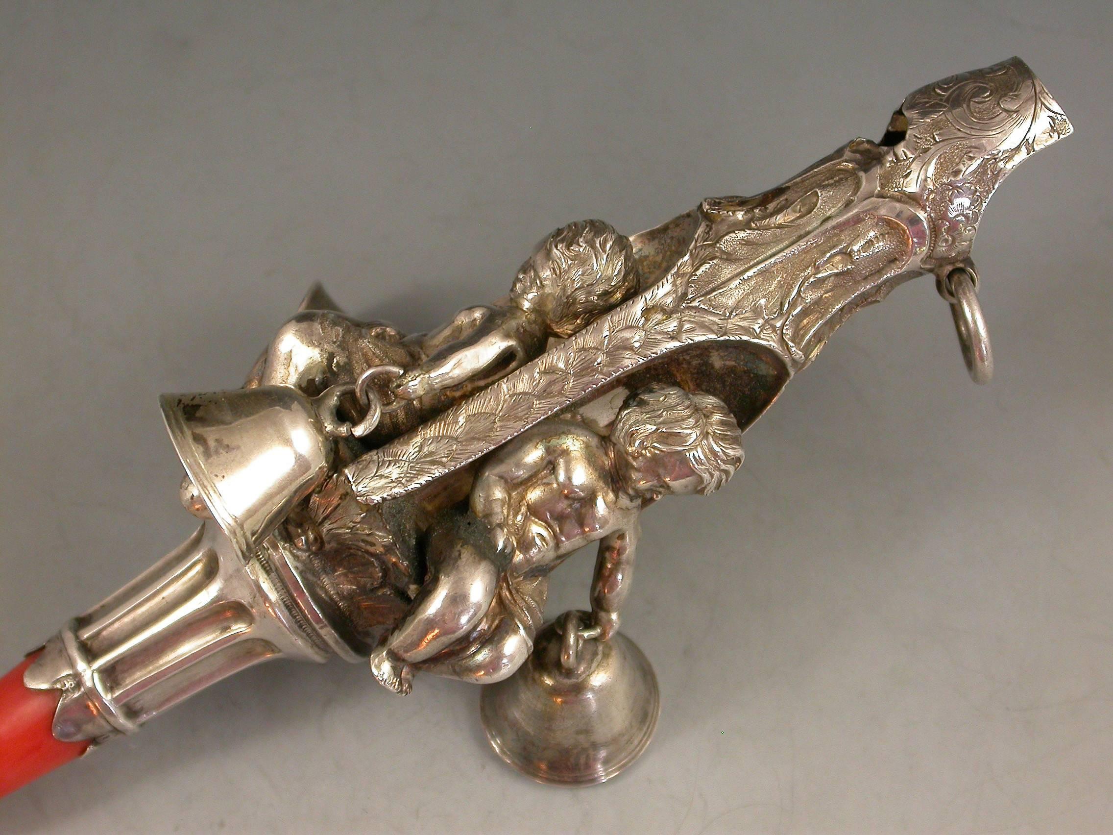 English Victorian Silver Baby's Rattle Alcoves Inset With Putti