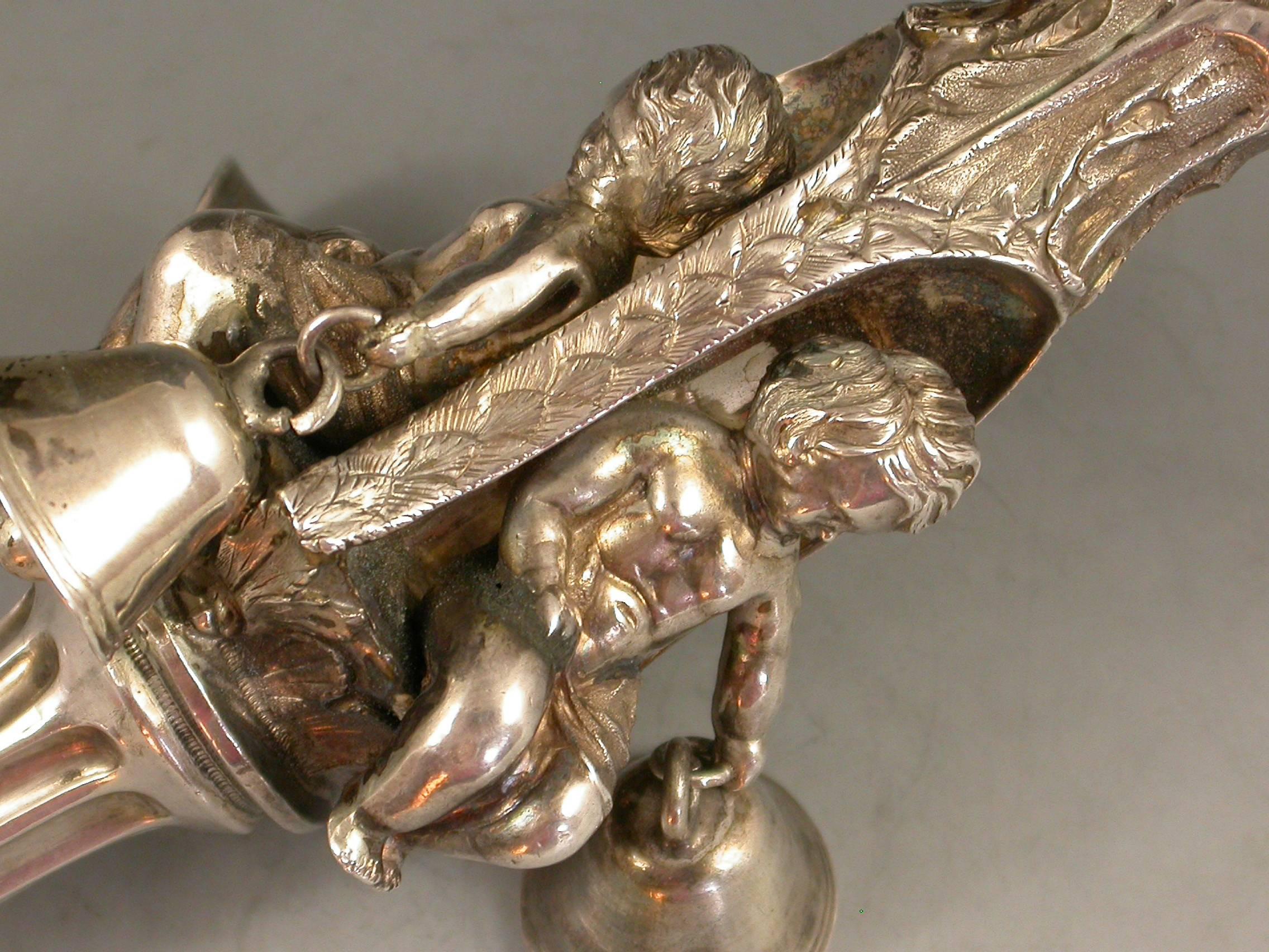 Victorian Silver Baby's Rattle Alcoves Inset With Putti In Good Condition In Sittingbourne, Kent