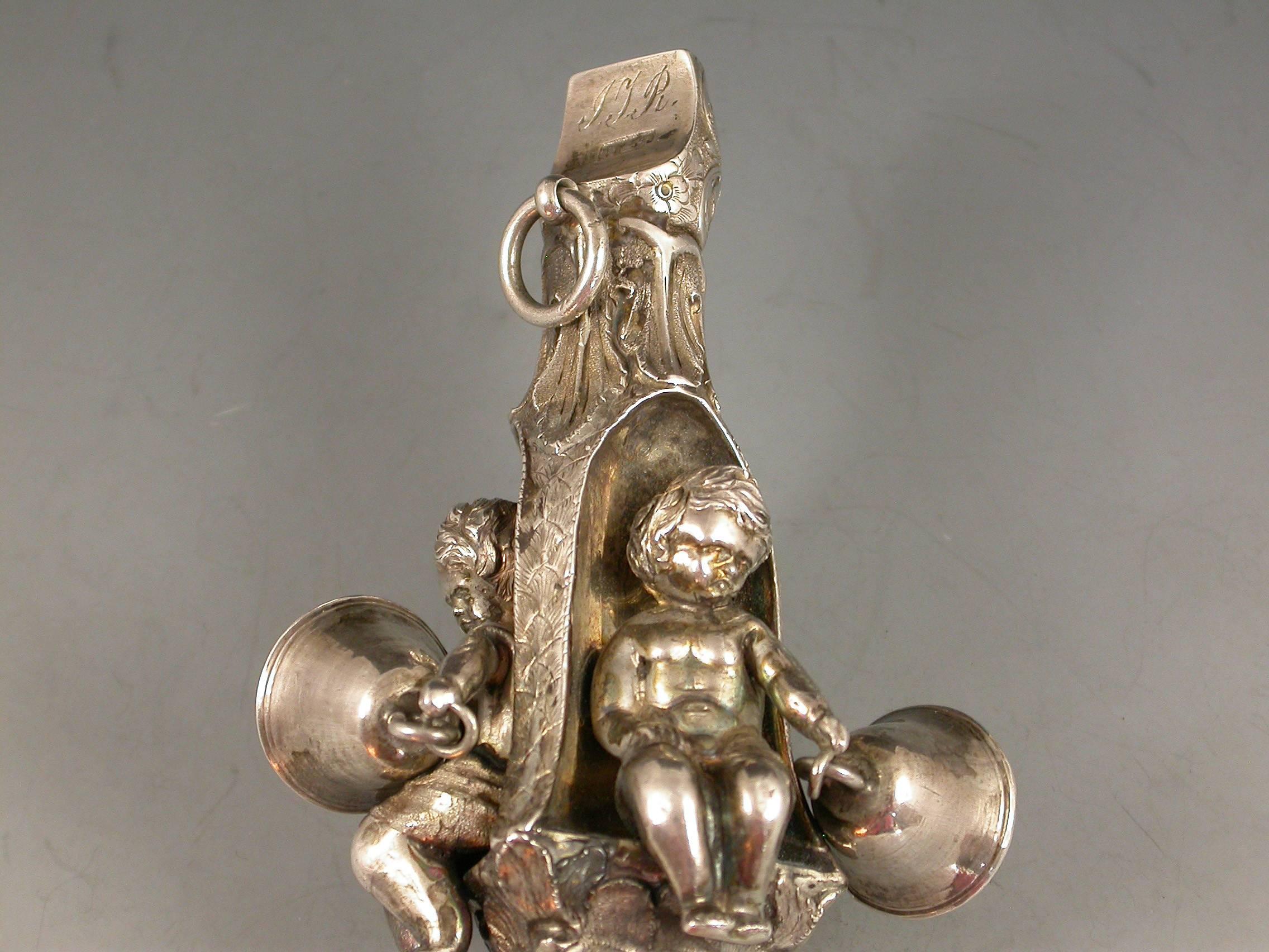 Victorian Silver Baby's Rattle Alcoves Inset With Putti 2