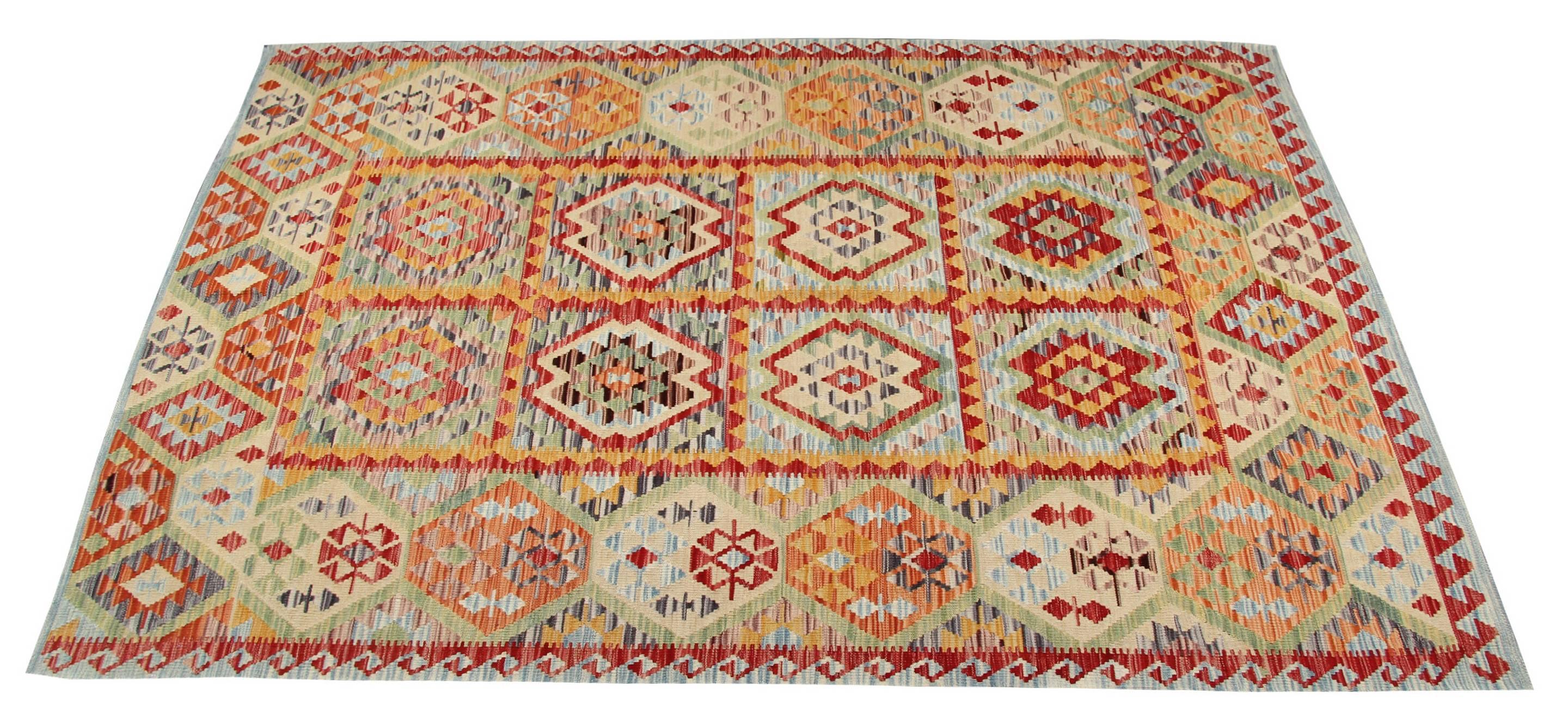 This new traditional Kilim rug is very fascinating. In fact, it reports the designs of the traditions but the manufacture is new: it was handmade in Afghanistan and uses tribal motifs. The Kilim is called 'Floral' because it reports symbols which