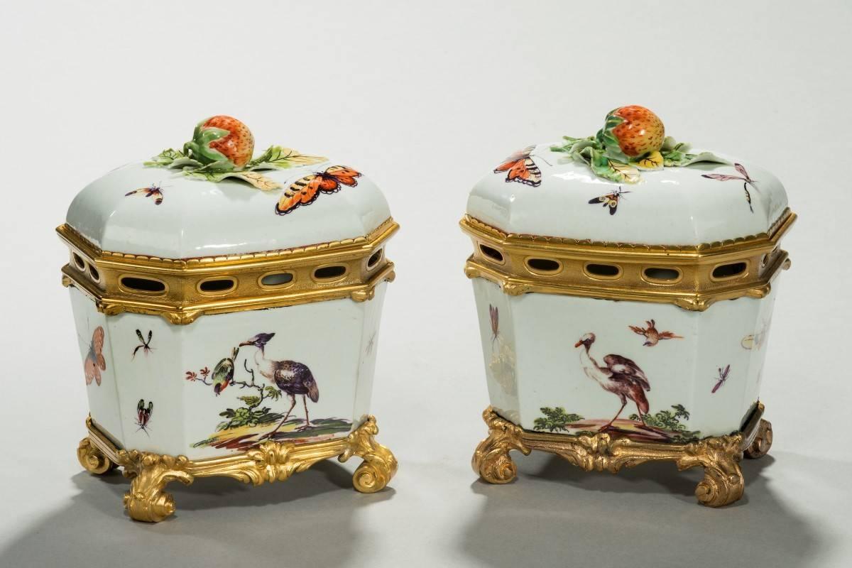 Ormlu mounted butter tubs. A rare pair of 18th century Derby butter tubs with covers and later ormolu mounts. The whole is beautifully executed with exotic plants and stylised animals. 
Burghley House, Stamford, in Lincolnshire has a collection of