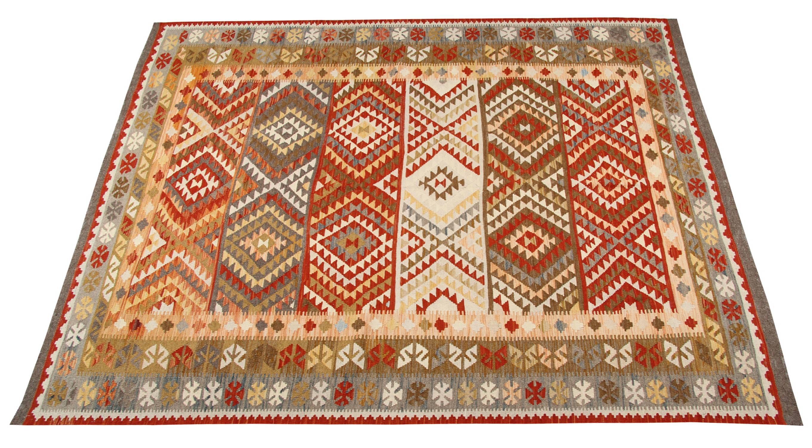 The original Kilim rug shown is mainly red, dark grey, light yellow and olive green. And the geometric patterns are symmetrical and pleasant. In reality, the design is composed of the symbols inspired by Persian Quasgai rugs. Particularly the
