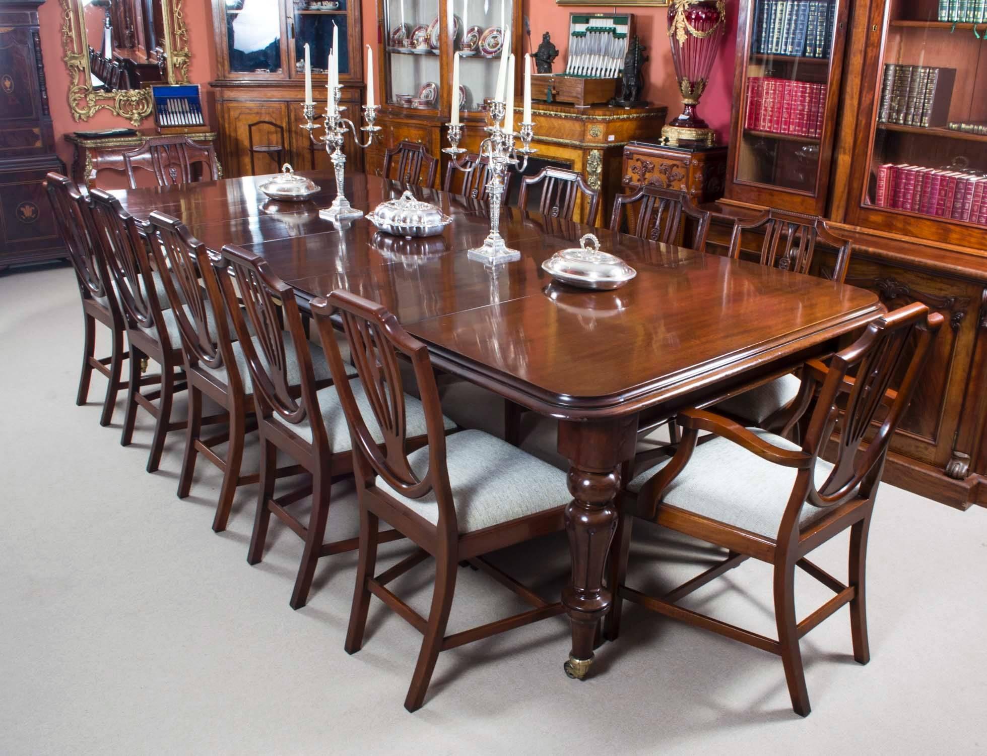 This is a beautiful antique dining set comprising a William IV mahogany dining table, circa 1840 in date with a set of twelve English Shield Back dining chairs. 

This amazing table has four original leaves and can comfortably seat twelve people.