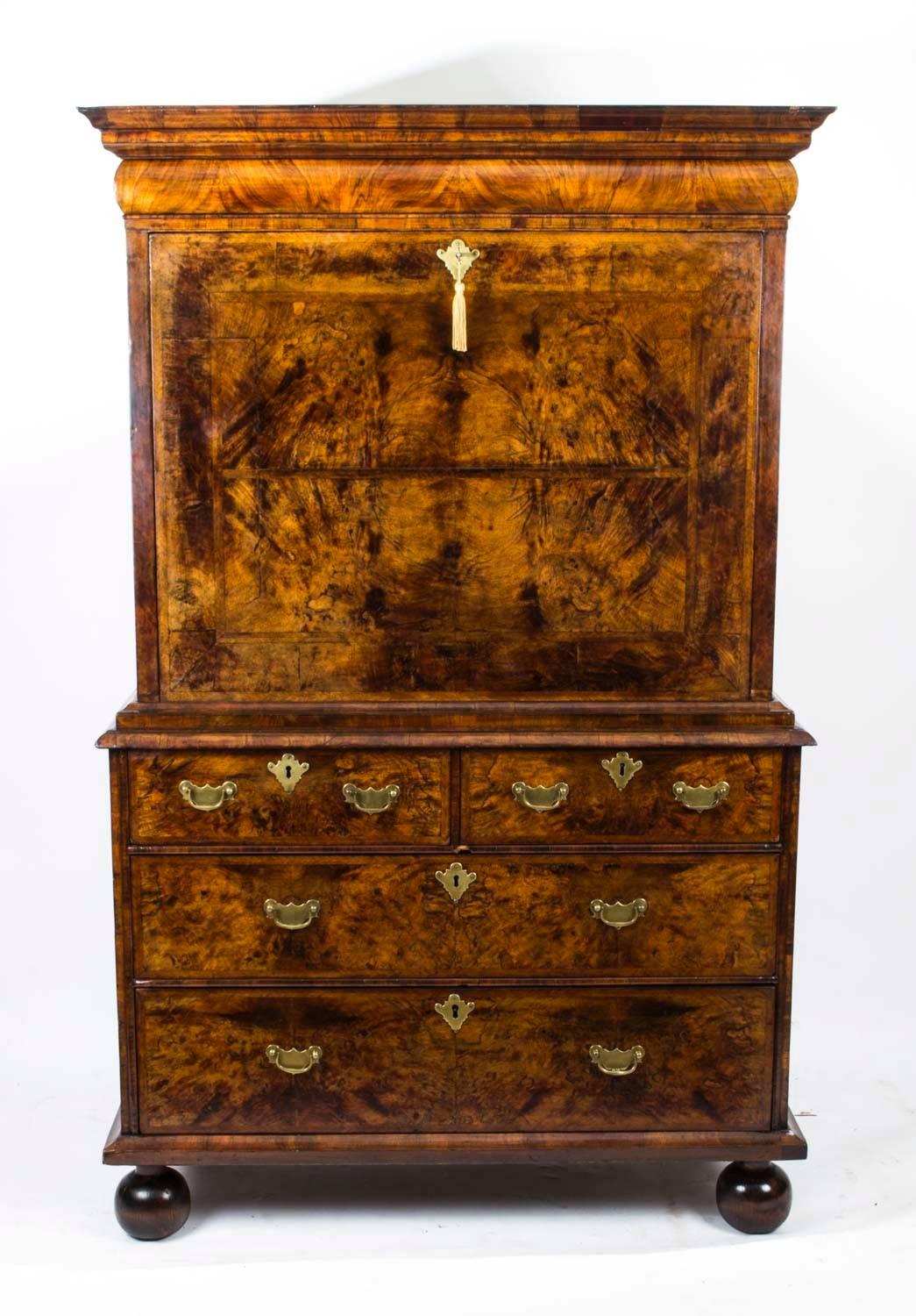 Dating from around 1705, this very special piece of finely crafted furniture is an antique walnut secretaire in the Queen Anne style.

This very early 18th Century Queen Anne antique walnut secretaire chest is sure to fill you with admiration when