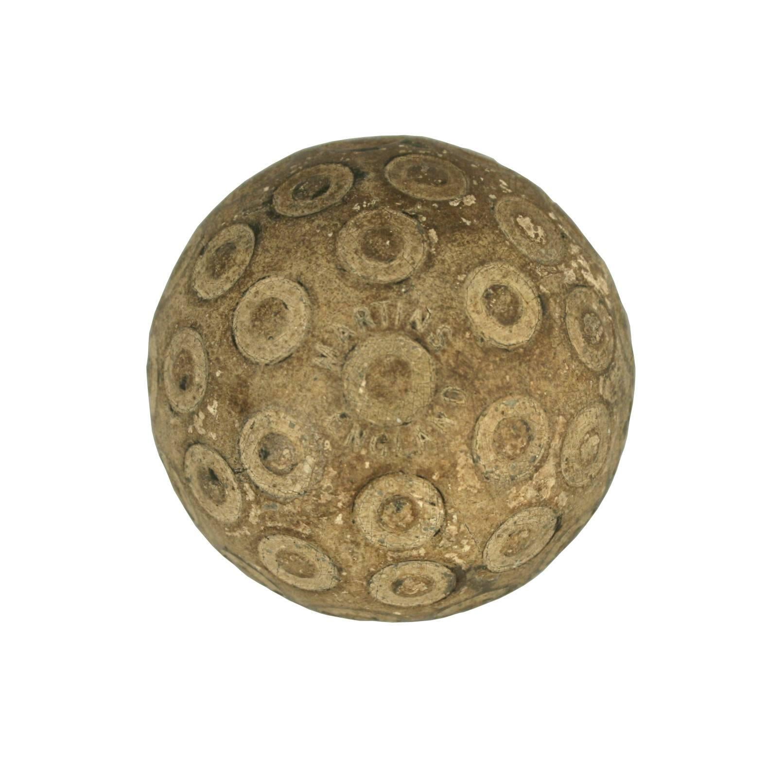 Martins ‘Zodiac’ golf Ball.
A good example of a ‘Zodiac’ rubber core golf ball with an unusual pattern. The pattern consists of raised studs within circles. The golf ball is manufactured by Martins, England. The Martins-Birmingham Ltd. was one of