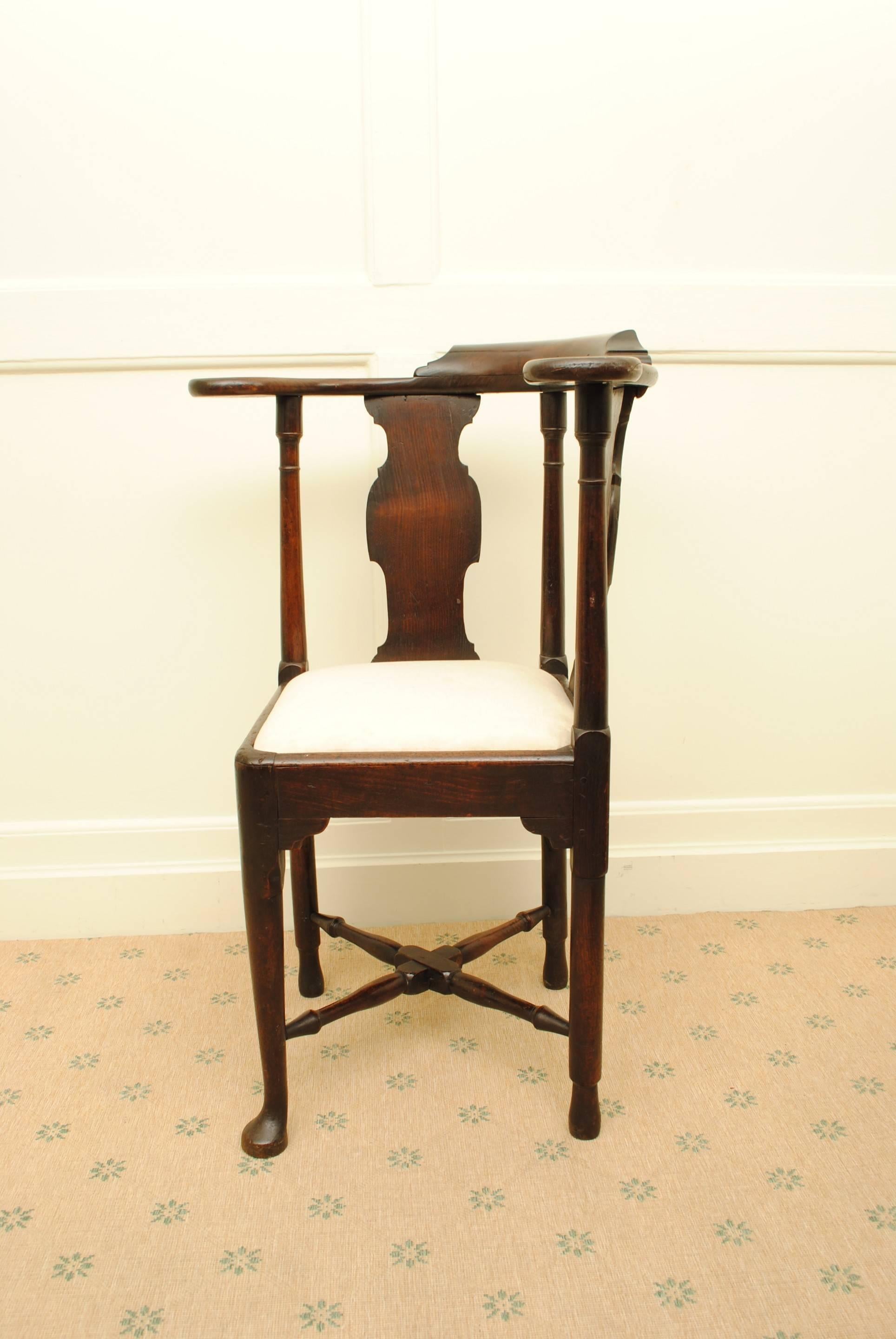 A large example of a mid 18th century mahogany corner chair with vase shaped back splat, good cpouor and patination.