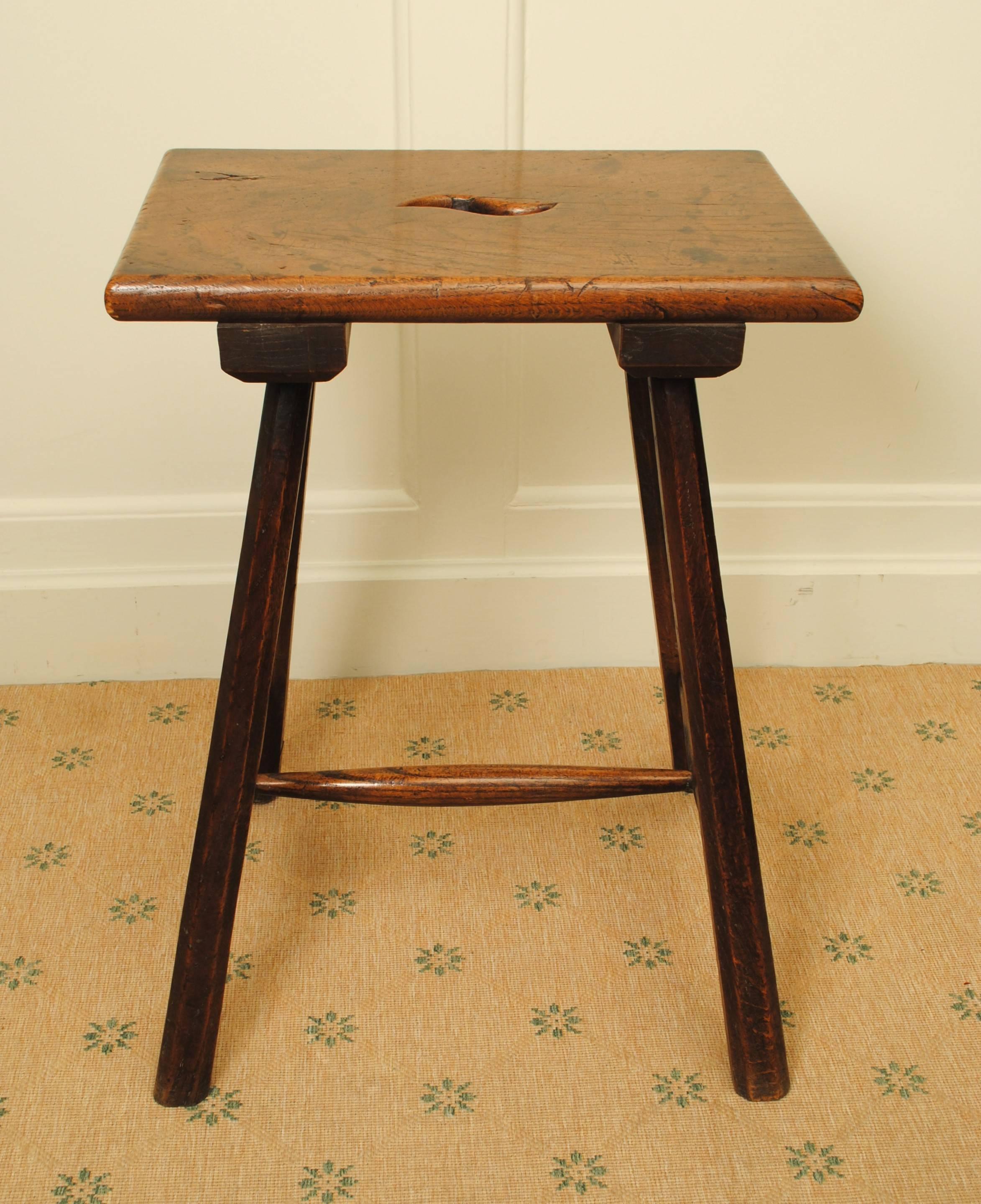 A good example of an 18th century elm stool of great colour