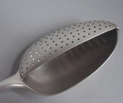 A rare George III "Hooded" Strainer Spoon made in London circa 1775 by Thomas Ch