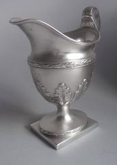JOHN SCHOFIELD. An exceptional George III Helmet Milk Jug made in London in 1795
