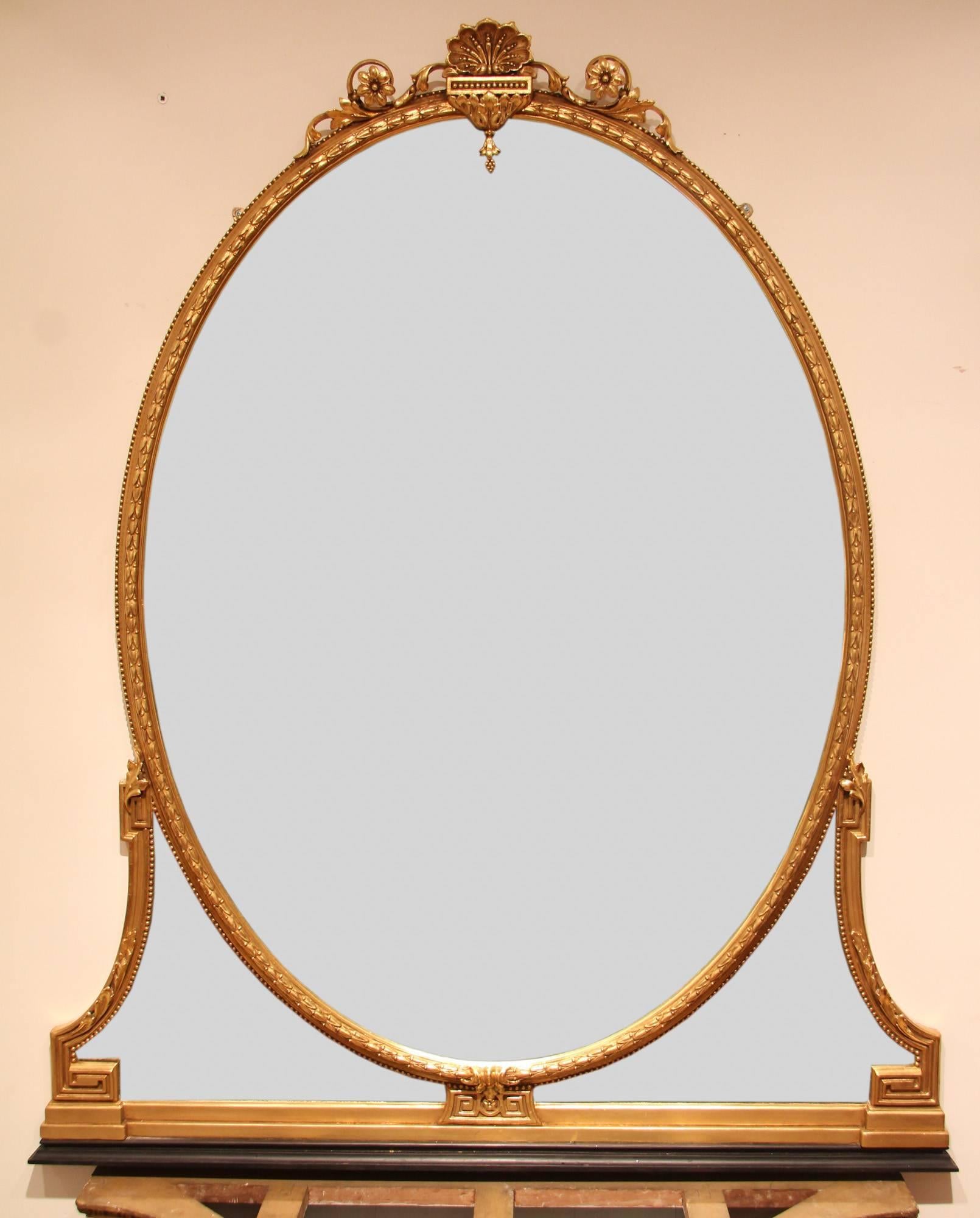 Early Victorian oval overmantel mirror, original mercury plate. Recently re-gilded, circa 1850. 

Dimensions: 
width 54