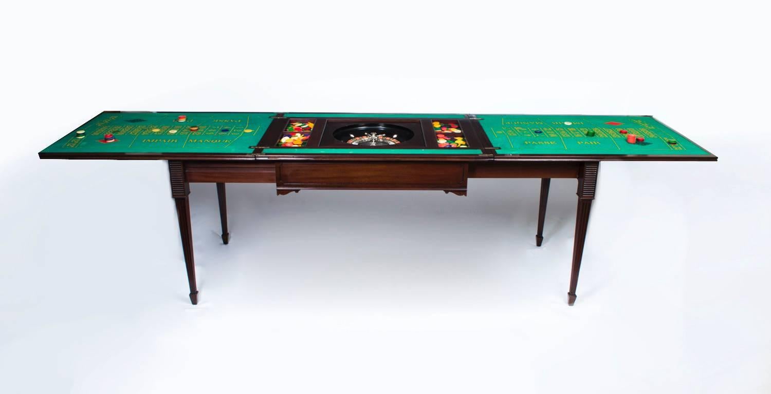 This is a superb antique Victorian mahogany rectangular roulette games table, circa 1880 in date. 

It has a double foldover top with a reeded edge, when the top is fully extended the roulette table becomes an impressive size, ideal for playing
