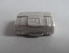 An unusually tiny George III Vinaigrette modelled as a satchel. Made in Birmingh