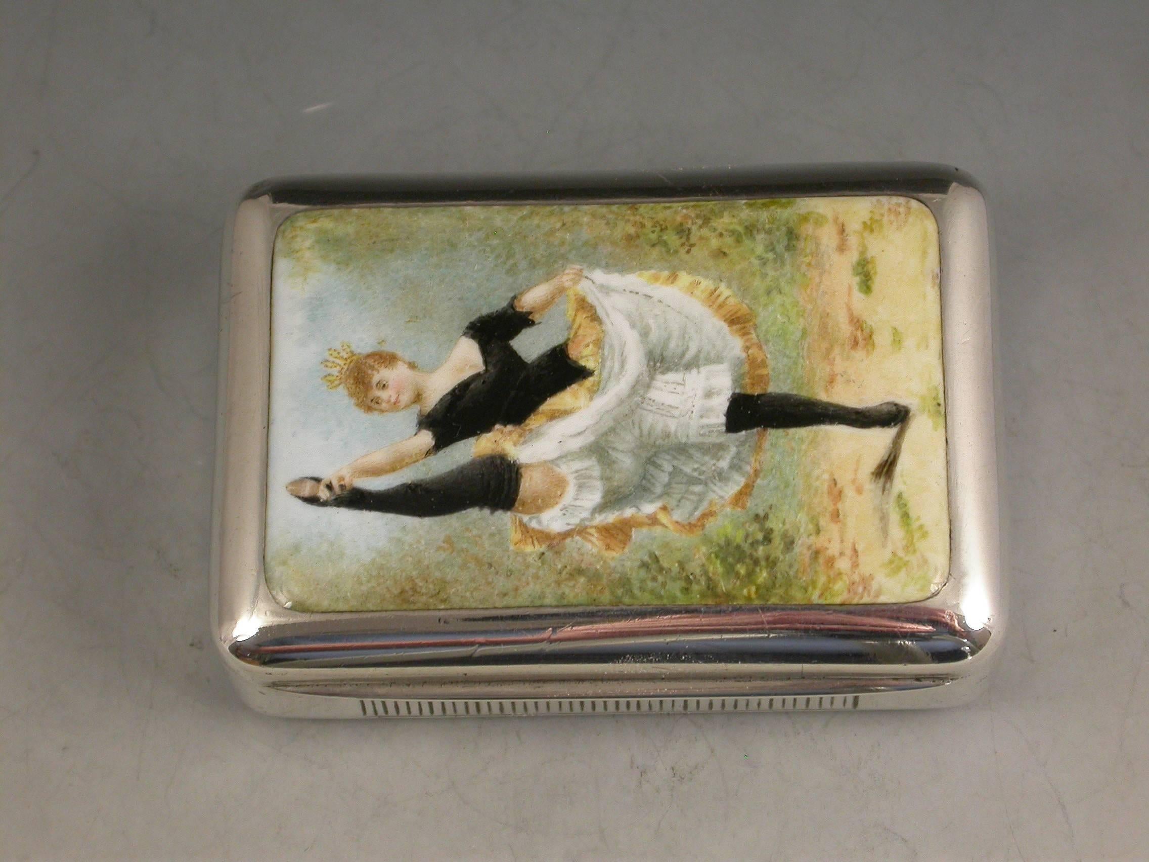 A nice quality Victorian silver and enamel vesta case of rounded rectangular form with hinged lid, the cover inset with an enamel panel depicting a Victorian can-can girl displaying bloomers and petticoats. Silver gilt interior and a striker plate