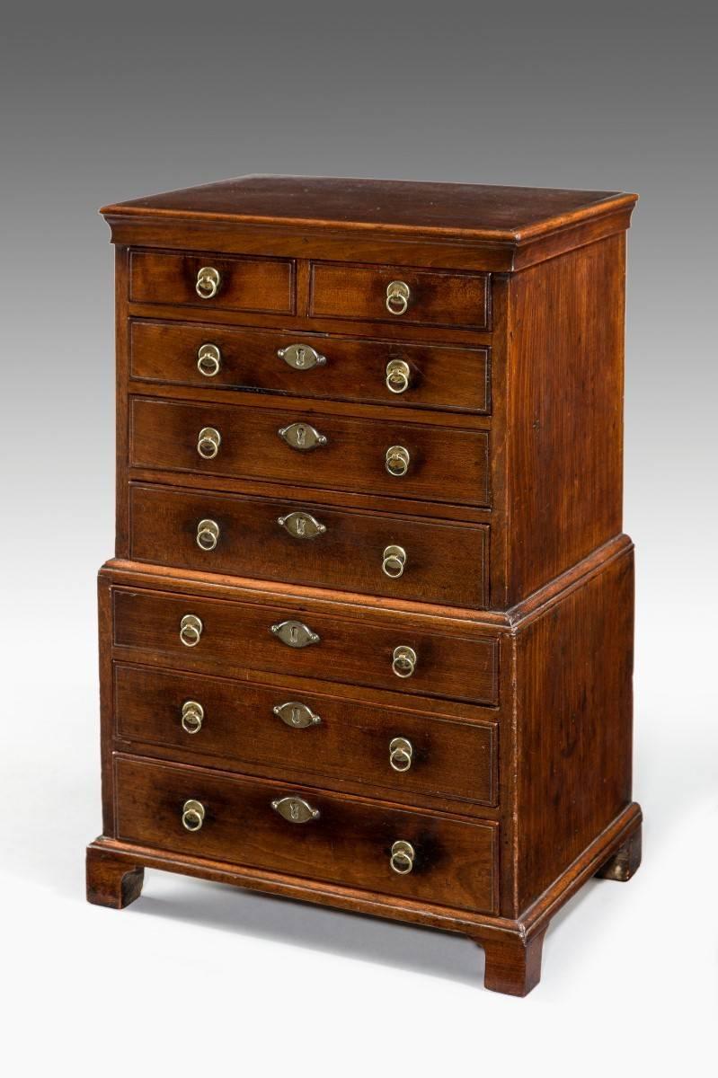 An outstanding miniature 18th century mahogany chest on chest or tall boy. I would say that this article is a 'Tradesmans sample' the quality of the detail is second-to-none. 
The finest mahogany has been used, and secondary timber used is oak,